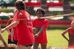 Students play mudbowl in Dunn Center bowl